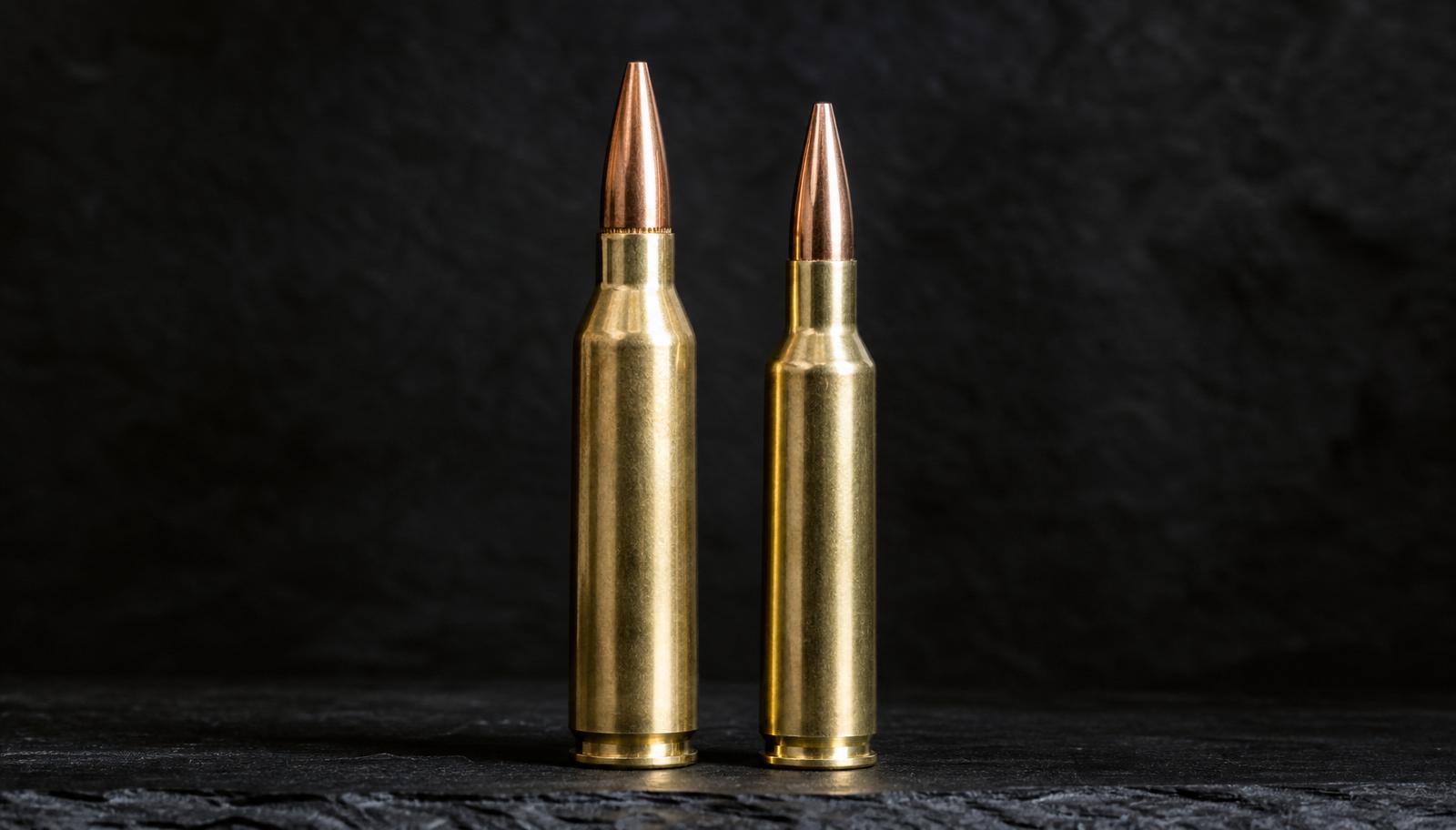 A 6.5 Grendel and a 6mm ARC cartridge standing side by side on dark slate for comparison.