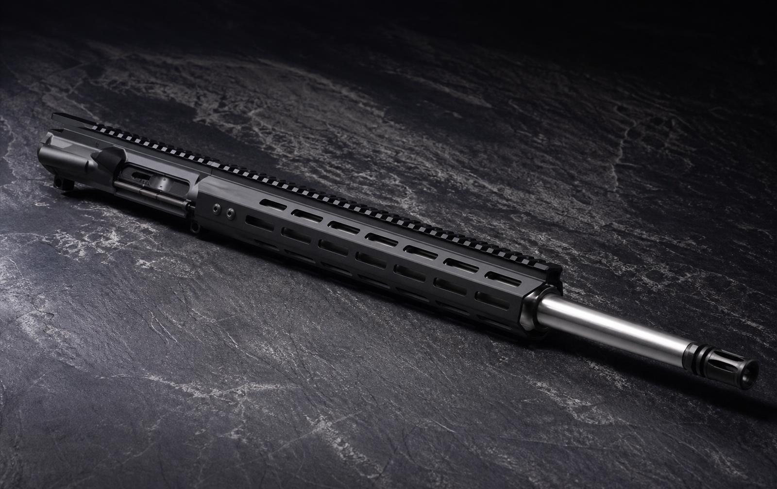 Complete AR-15 upper receiver with 16-inch stainless barrel and free-float M-LOK handguard on dark slate.