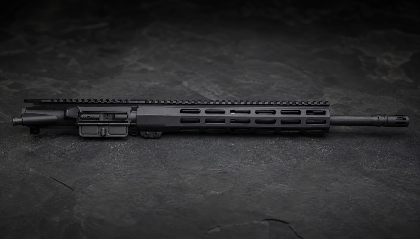 Complete AR-15 upper receiver with a 16 inch mid-length gas barrel and free-float M-LOK handguard on dark slate.